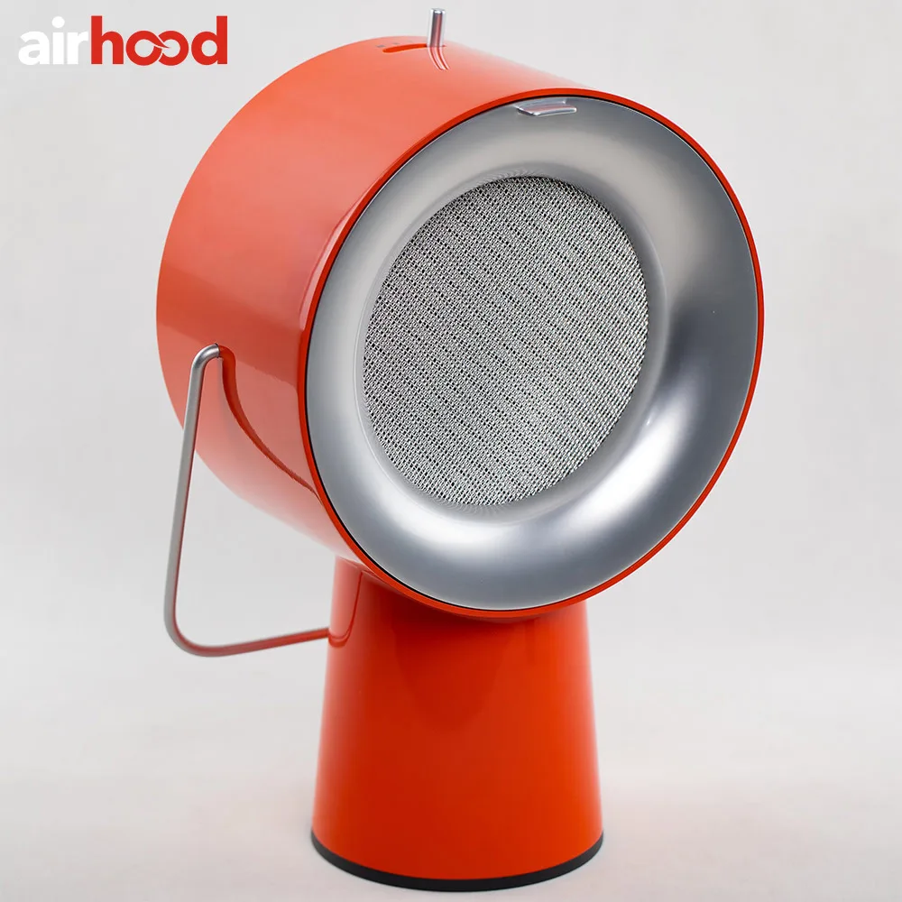 AirHood ad image: the red AirHood turned to show its silver mesh filter face, on a plain white backdrop under the airhood wordmark