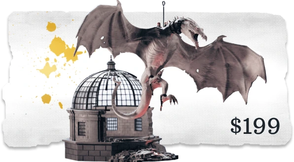 The campaign's torn-paper reward card: the Ukrainian Ironbelly dragon ornament banking over the Gringotts Bank dome ornament — $199.