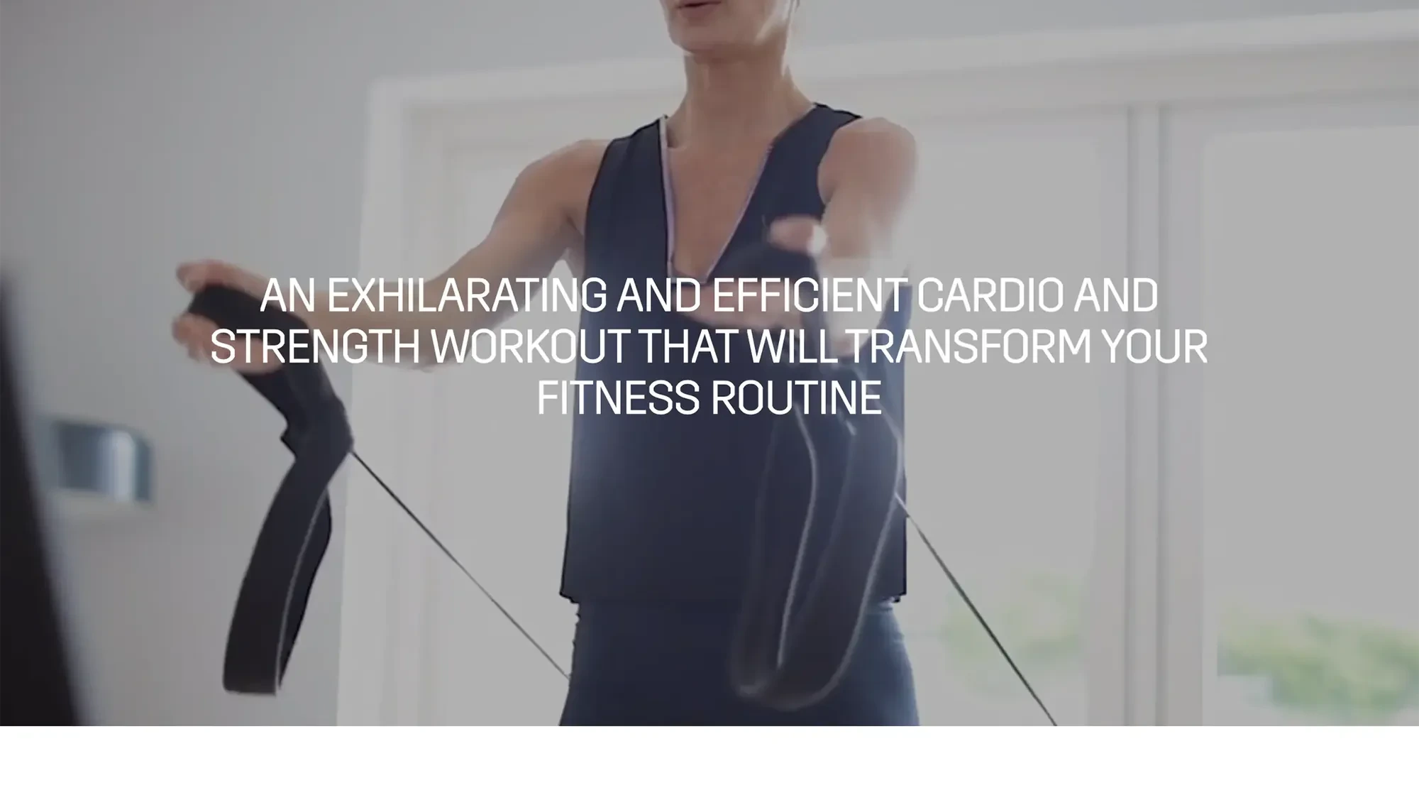 Full-bleed photo of a woman training, overlaid: AN EXHILARATING AND EFFICIENT CARDIO AND STRENGTH WORKOUT THAT WILL TRANSFORM YOUR FITNESS ROUTINE.