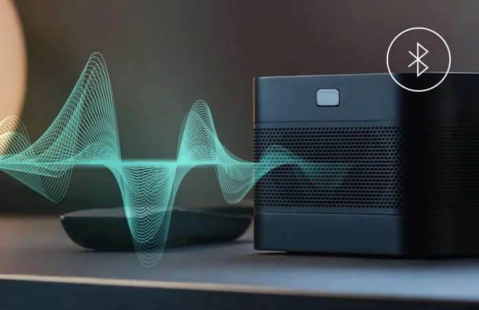 The U4 on a dark table, a green sound wave and a Bluetooth icon drawn beside it.